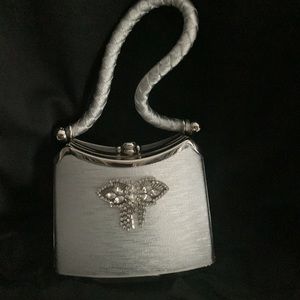 Vintage Silver evening bag. excellent condition no scratches. Only worn one time